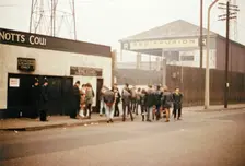 Outside the Notts County football ground, Meadow Lane, Nottingham, Nottinghamshire, 1968. Creator: George L Roberts