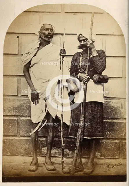 Oude, India: two men holding long sticks, c1860. Creator: Unknown.