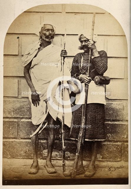 Oude, India: two men holding long sticks, c1860. Creator: Unknown.