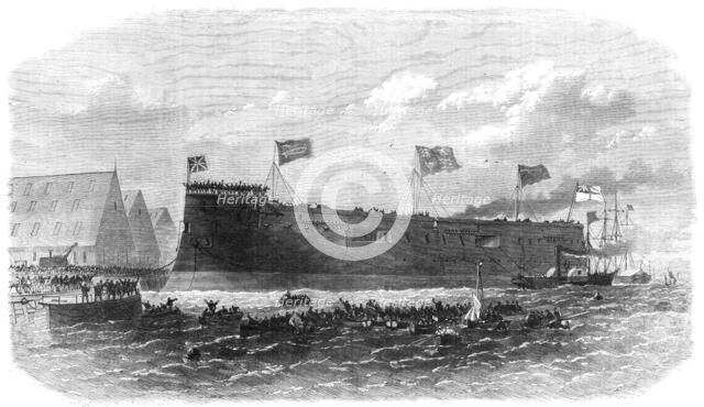 Our Iron-Clad Fleet: floating of Her Majesty's ship Hercules, at Chatham, 1868. Creator: Unknown.