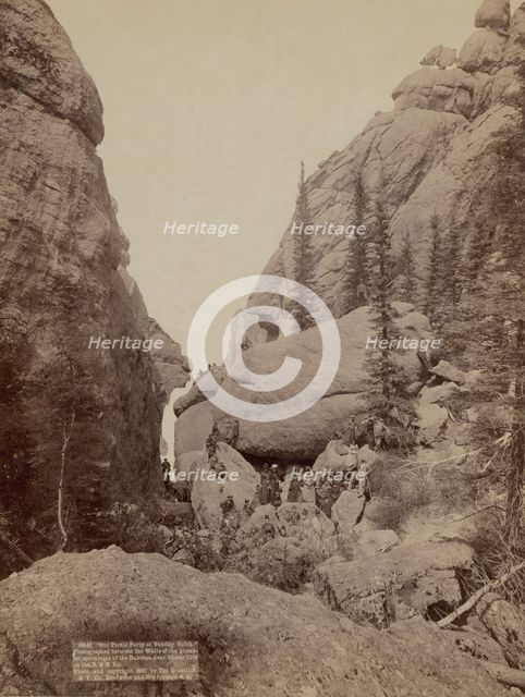 Our picnic party at Sunday Gulch Photographed between the walls of the grandest mountain..., 1891. Creator: John C. H. Grabill.