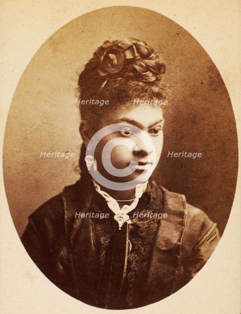 Oval quarter-length portrait of unidentified young woman, her bodice center trimmed..., c1870-c1879. Creators: Unknown, Moses Parker Rice.