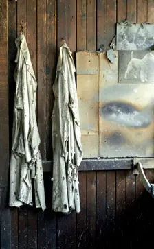 Overalls hanging up in JW Evans silversmiths factory, Birmingham, West Midlands, c1980-c2017. Artist: Historic England Staff Photographer