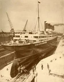 Overhauling a Large Liner in a Graving Dock at Liverpool c1930. Creator: Unknown