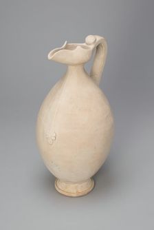 Ovoid Ewer with Flaring, Beak-Shaped Spout, Floral Medallion, and Zipper..., Tang dynasty, 8th cent. Creator: Unknown