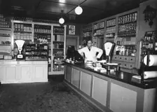 Owner Magnus Påhlsson in his grocer's shop, Sweden, 1943. Creator: Unknown