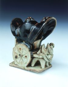 Ox-drawn covered wagon with lady passenger, late Tang dynasty, China, 9th century