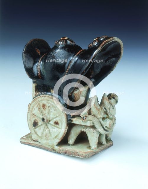 Ox-drawn covered wagon with lady passenger, late Tang dynasty, China, 9th century. Artist: Unknown