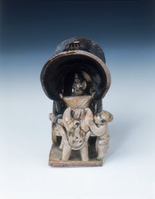 Ox-drawn covered wagon with lady passenger, late Tang dynasty, China, 9th century