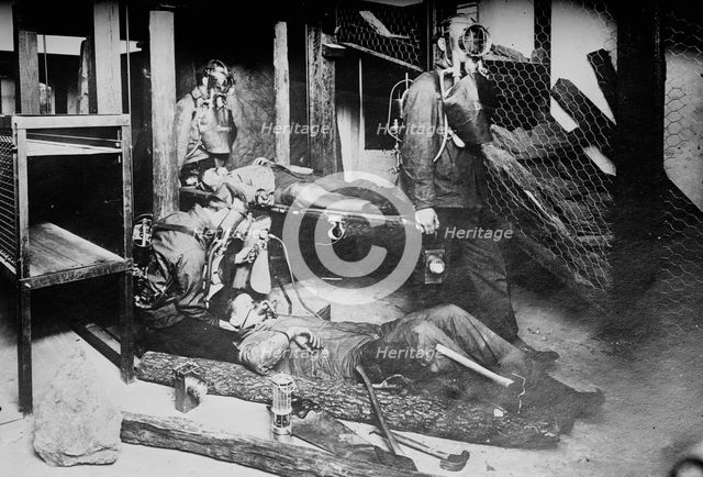 Oxygen helmets in mine rescues, between c1910 and c1915. Creator: Bain News Service.