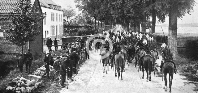 'L'aide Francaise a la Belgique; nos escadrons ont pris contact avec la cavalerie allemande', 1914.. Creator: Unknown.