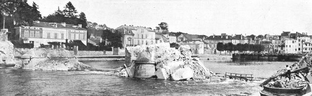 'L'immense champ de Bataille; le pont de pierre de Lagny avait ete detruit par le genie', 1914. Creator: Unknown.