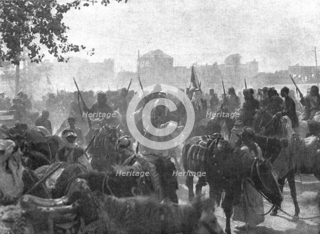 ''L'occupation de Damas; La cavalerie arabe dans les faubourgs de la ville, ou les..., 1918. Creator: Unknown.