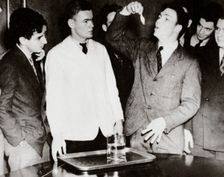 Lothrop Withington, Jr (right), a Harvard freshman, swallowing a goldfish, USA, 1935. Creator: Unknown