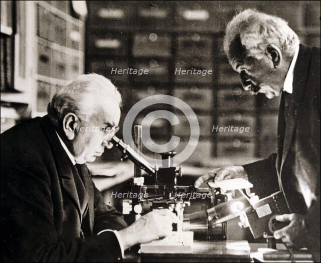 Louis and Auguste Lumière (1864-1948 and 1862-1954), French chemists and biologists in their labo…