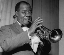 Louis Armstrong on stage on Day 2, Finsbury Park Astoria, London, 1962. Creator: Brian Foskett