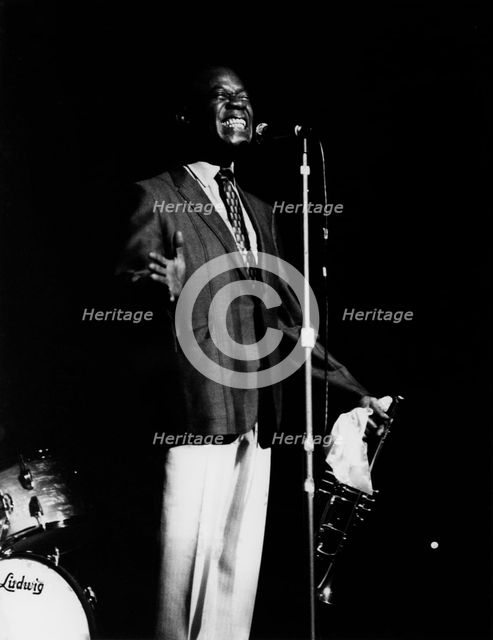 Louis Armstrong on stage, Hammersmith Odeon, London, 1968.  Creator: Brian Foskett.