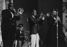 Louis Armstrong and All Stars on stage, Hammersmith Odeon, London, 1968. Creator: Brian Foskett