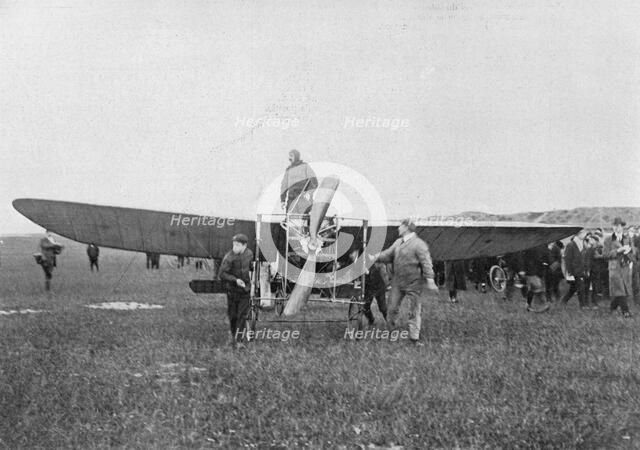 Louis Blériot about to make the first successful flight across the English Channel, 1909. Artist: Unknown