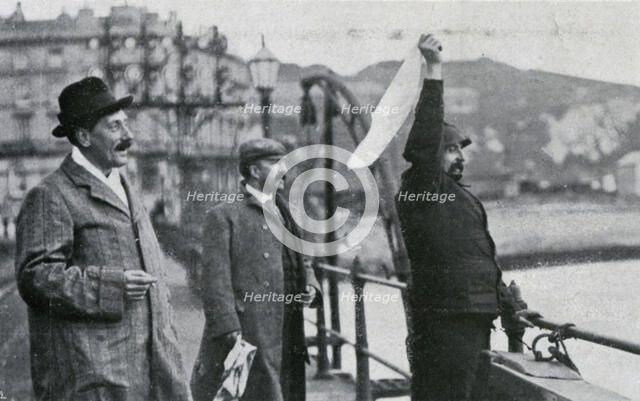 Louis Blériot on the pier at Dover after his flight across the English Channel, 25 July 1909. Artist: Unknown