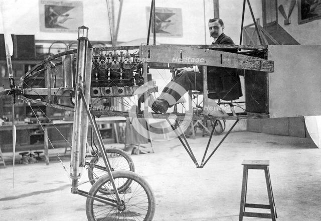 Louis Blériot sitting in his monopolane, c. 1920.