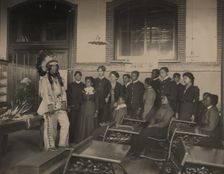 Louis Firetail (Sioux, Crow Creek), wearing tribal clothing, in American history..., 1899 or 1900. Creator: Frances Benjamin Johnston