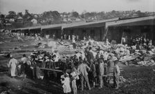 Louisiana Flood 1912, Cotton Compress at Vicksburg as a refuge, 1912. Creator: Bain News Service
