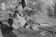 Louisiana Flood - refugees cook government rations, 1912. Creator: Bain News Service