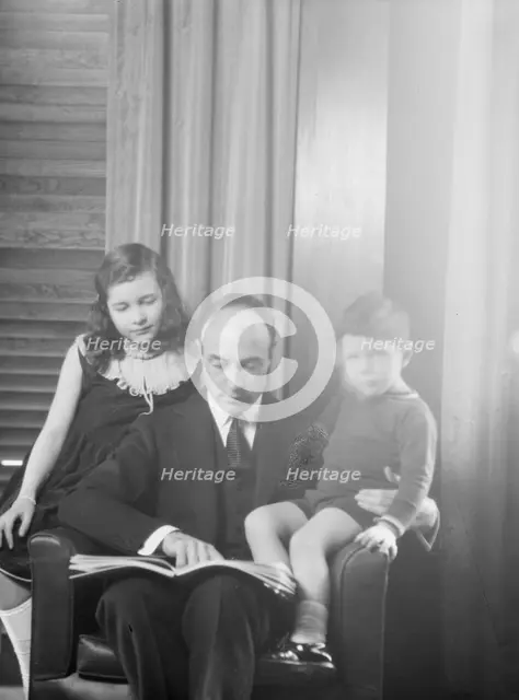 Lovett, Robert, Mr., and children, portrait photograph, 1930 Mar. 31. Creator: Arnold Genthe.