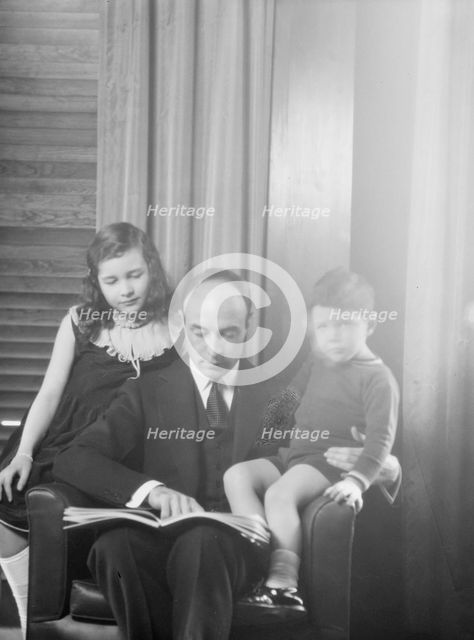 Lovett, Robert, Mr., and children, portrait photograph, 1930 Mar. 31. Creator: Arnold Genthe.