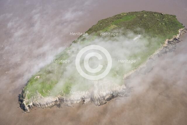 Low cloud over the island of Steep Holm, North Somerset, 2018. Creator: Historic England Staff Photographer.