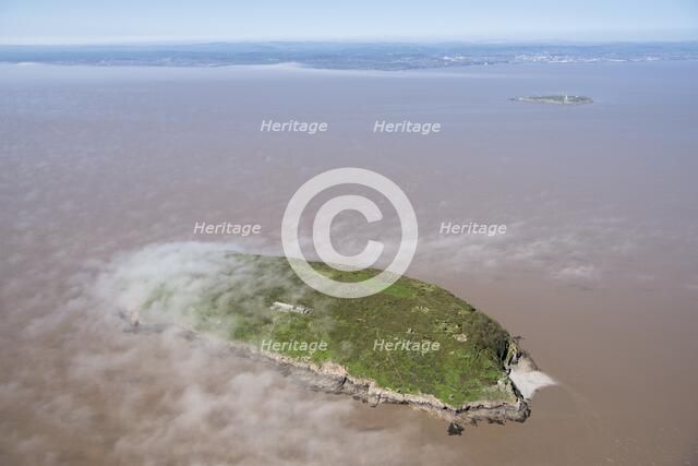 Low cloud over the island of Steep Holm, North Somerset, 2018. Creator: Historic England Staff Photographer.