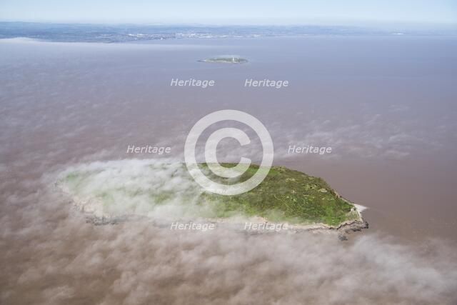Low cloud over the island of Steep Holm, North Somerset, 2018. Creator: Historic England Staff Photographer.