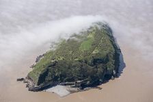 Low cloud over the island of Steep Holm, North Somerset, 2018. Creator: Historic England Staff Photographer