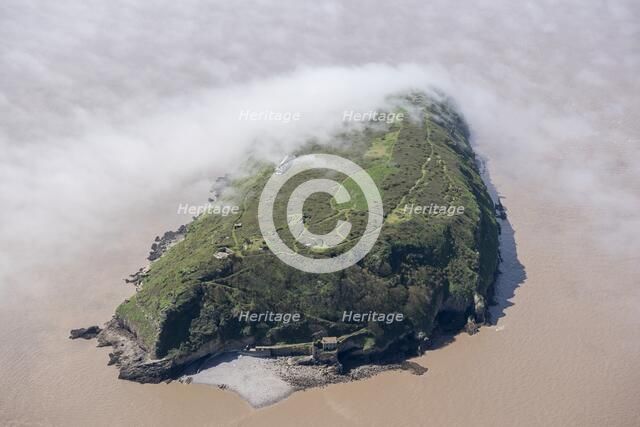 Low cloud over the island of Steep Holm, North Somerset, 2018. Creator: Historic England Staff Photographer.