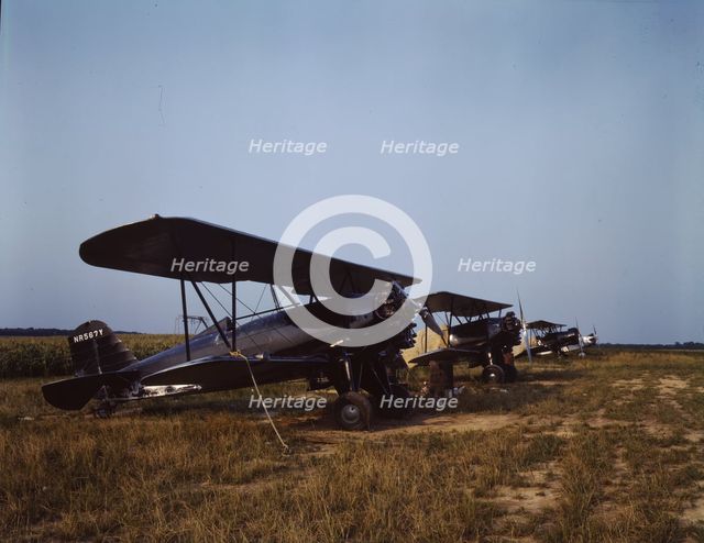 Low flying planes from which dust or insecticide is spread..., Seabrook Farm, Bridgeton, N.J., 1942. Creator: John Collier.