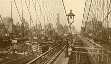 Lower Manhattan Viewed Through The Network Of Cables On Brooklyn Suspension Bridge c1930. Creator: ENA