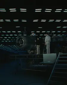 Lowering an engine in place in assembling...Consolidated Aircraft Corp..., Fort Worth, Texas, 1942. Creator: Howard Hollem
