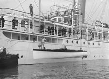 Lowering Liberty's motor launch, 1914. Creator: Kirk & Sons of Cowes