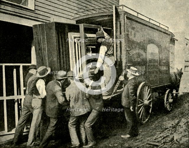 'Loading The Camera On A Van For Removal', 1901. Creator: Unknown.