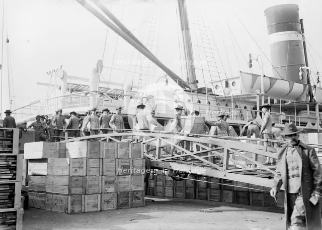 Loading U.S. Army transport ship Meade - League Isl'd., 1913. Creator: Bain News Service.
