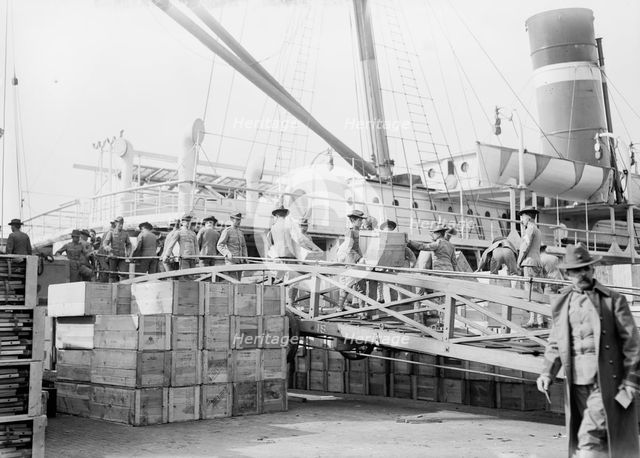 Loading U.S. Army transport ship Meade - League Isl'd., 1913. Creator: Bain News Service.