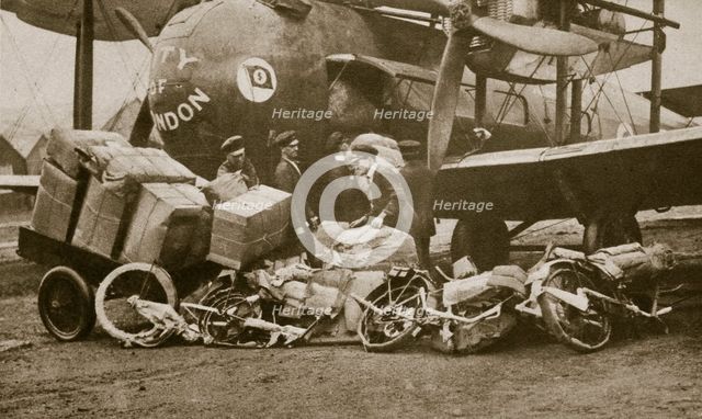 Loading Vickers-Vimy aircraft 'City of London' with motorbike frames for Cologne, c1919-c1929(?) Artist: Unknown