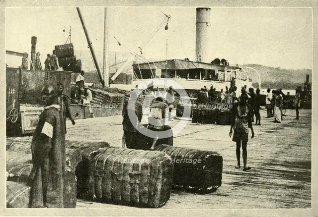 'Loading a Cargo of Cotton', c1948. Creator: Unknown.