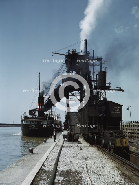 Loading a lake freighter with coal at the Pennsylvania R.R. coal docks...Sandusky, Ohio, 1943. Creator: Jack Delano.