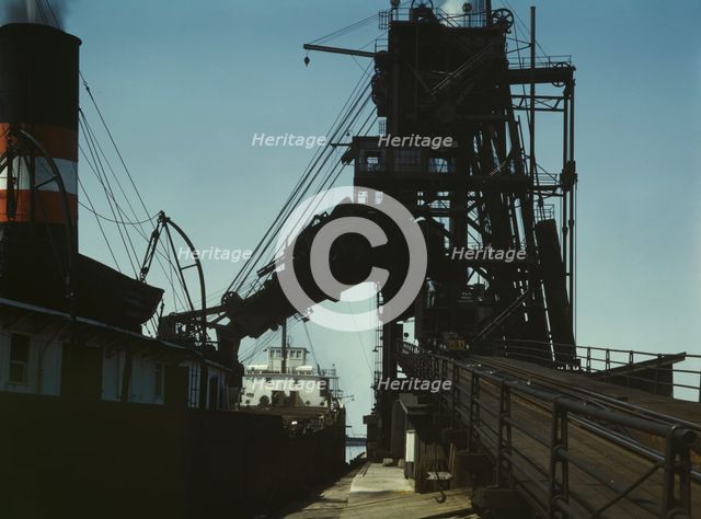 Loading a lake freighter with coal for shipment to other lake ports, Sandusky, Ohio, 1943. Creator: Jack Delano.