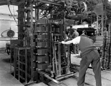 Loading a palletising machine with bricks, Whitwick Brickworks, Coalville, Leicestershire, 1963. Creator: Michael Walters