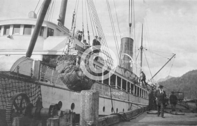 Loading copper on ship, between c1900 and 1916. Creator: Unknown.