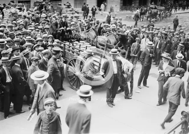 Loading gold for shipment abroad, between c1910 and c1915. Creator: Bain News Service.
