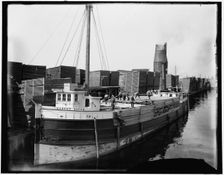 Loading lumber on steamer at lumberyards, Menominee, Mich., c1898. Creator: Unknown